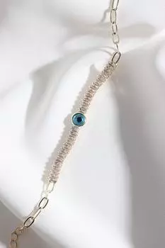 Браслет золотого цвета с багетным цирконом и бусинами от сглаза