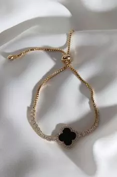 Браслет золотого цвета с черным эмалированным клеверным лифтом