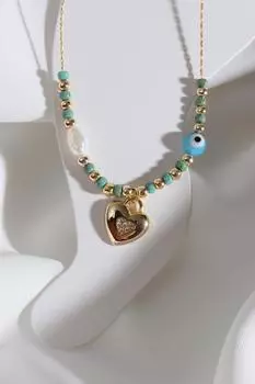 Браслет золотого цвета с подвеской в виде сердца из камня и циркона