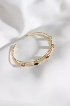 Браслет золотого цвета с разноцветными камнями циркона