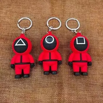 Брелок для ключей «Игра в кальмара» Красный брелок для косплея «Игры в кальмара» Телевизионный тематический солдат в маске Милый мультяшный силиконовый брелок для ключей Round Head Triangle Design