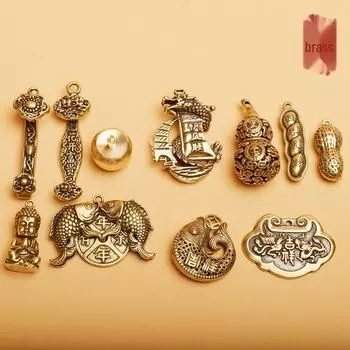 Брелок из латуни в виде драконьей лодки с подвеской в виде мира и удачи и арахисового яблока