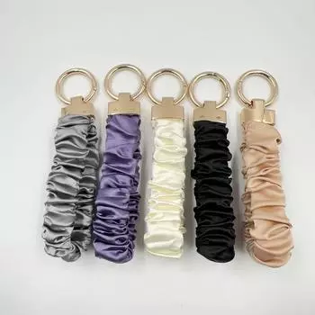 Брелок-кольцо в виде кишки из высококачественного металла с эластичной нитью и плиссированной сумкой-подвеской шампанского