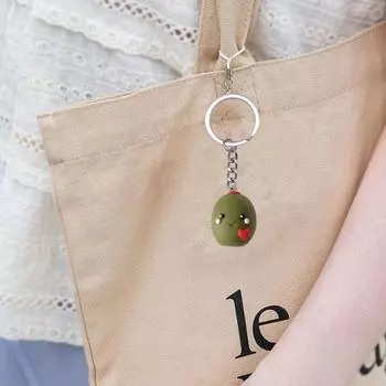 Брелок-подвеска из смолы Маленький человек, держащий сердце Брелок-подвеска Express Love Маленький 1