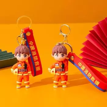 Брелок-подвеска в виде мультяшного пожарного и грузовика - забавный сувенир и небольшой подарок