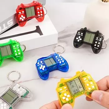 Брелок с игрой Тетрис: Развивающая и веселая мини-игрушка для детей пастельный оранжевый