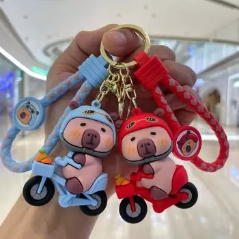 Брелок в виде мультяшной капибары в стиле животных, брелок в виде капибары в стиле аниме на велосипеде, брелок для салона автомобиля красный