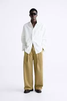 БРЮКИ ШИРОКОГО КРОЯ СО СКЛИСАМИ