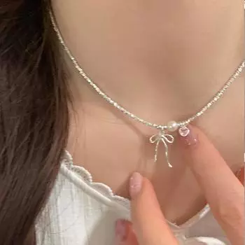 Сломанный серебряный металлический бант с жемчугом Love Pearl Ожерелье Женский дизайн Sense Niche Личность Универсальная цепочка на шею Цепочка на ключицу