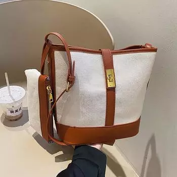 Canvas bag women s new 2025 trendy retro fashion shoulder messenger bag niche design contrasting color splicing bucket bag чёрный