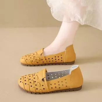 Casual hollow hole shoes summer new flat heel one pedal shoes woven round head retro flat sandals 35