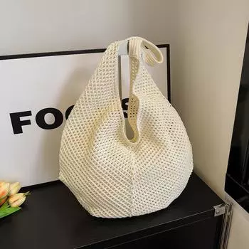 Casual large-capacity cotton thread woven bag new hollow woven bag lazy wind shoulder bag vacation beach bag women s bag