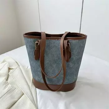Casual retro bucket bag women s 2024 autumn new trend shoulder underarm bag niche large-capacity commuter bag серый