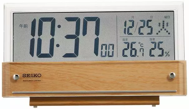 Часы Seiko Настольные часы Будильник Радио Цифровой календарь Дисплей температуры и влажности ЖК-дисплей Светло-коричневый узор под дерево Корпус x 19 x см SQ782B
