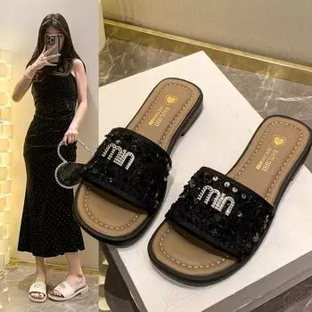 Cool slippers women s summer wear 2025 new flat-bottomed beach sandals fashionable women s soft-soled small fragrant style one-word drag 35