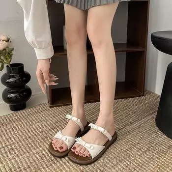 Design sense niche flat-bottomed cool slippers women s 2025 summer new retro bow word with open-toed cool slippers 35