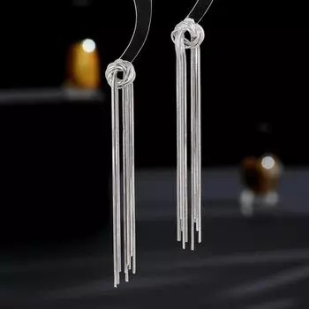Designer niche light luxury high-end earrings tide silver needle creative rope knot sister-in-law with the same gold fringed earrings золотой