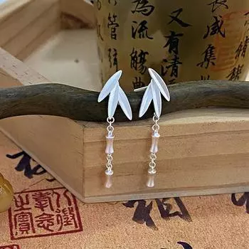 Дизайн в старинном стиле с бамбуковыми соединениями и бамбуковыми листьями. Длинные стили и высококачественные литературные серьги, которые сделают ваше лицо худым.