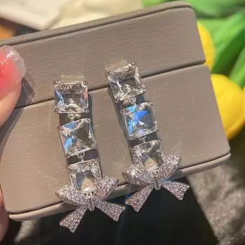 Дизайнерские длинные серьги-бантики из циркония Super Flash Jewelry Temperament