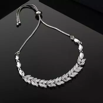 Дизайнерский женский браслет Estele с родиевым покрытием и фианитом в форме листа