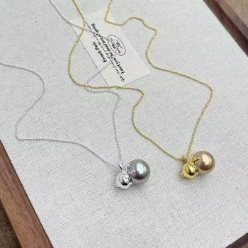 Длинное ожерелье с подвеской в виде золотой тыквы: Элегантная, легкая роскошная цепочка для свитера с универсальным дизайном N1401 Brushed Gourd Bow Necklace серебряный