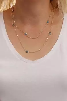 Длинное синее ожерелье золотого цвета сглаза