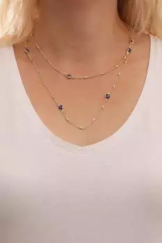 Длинное темно-синее ожерелье золотого цвета сглаза