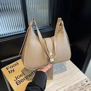 Досуг модная простая атмосфера пригородных поездок персонализированная сумка-полумесяц модная сумка через плечо 2024 модная новая нишевая портативная женская сумка чёрный