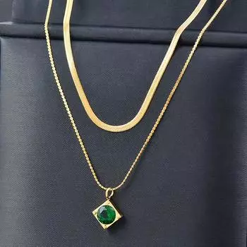 Двухслойная цепочка на ключицу из титана, титана, стали, зеленого вермикулита.