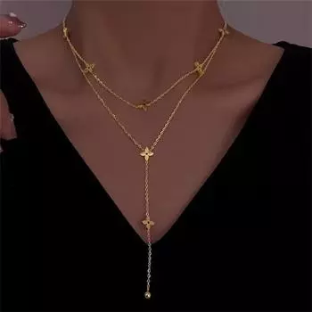 Двухслойное колье из титановой стали с цепочкой в виде клевера на ключице золотой