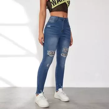 Джинсы с зауженной талией и рваными нашивками с леопардовым принтом для женщин S синий