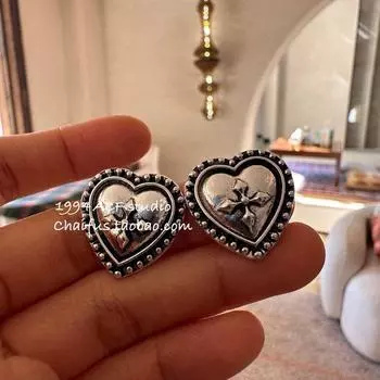 E561 Studio Metal Distressed Carved Cross Stud Earrings Silver a pair