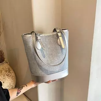 Edition niche bucket bag fashionable denim hand carry women s bag new simple commuter trendy single shoulder underarm bag