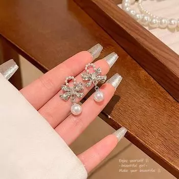 Elegant Bow Pearl Earrings with S925 Silver Needle, Sophisticated Design for Women серебряный