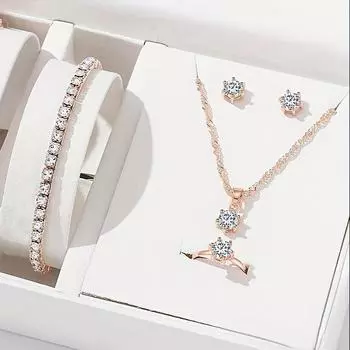 Elegant Rose Golden Jewelry Set with Rhinestone Accents - Includes Necklace, Earrings, Bracelet, and Ring жёлтый