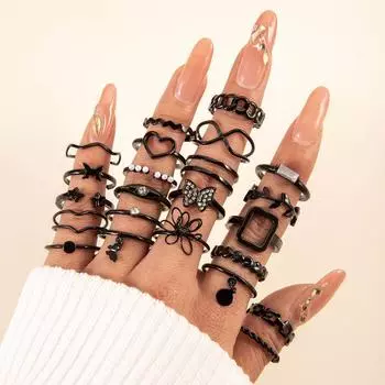 European and American fashion niche design sense iron butterfly hollow love twist multi-joint stacking ring set