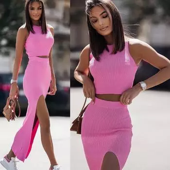 2025 Новый женский комплект из однотонного топа без рукавов с круглым вырезом и юбкой миди с боковыми разрезами – облегающий комплект из двух предметов S розовый