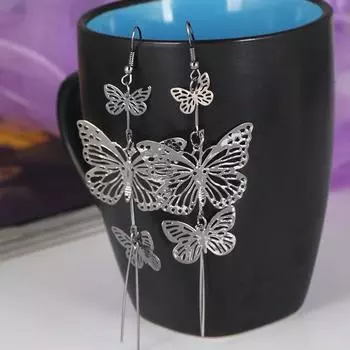 «Европейские и американские модные серьги-кисточки в виде бабочек»: Длинный, полый и преувеличенный дизайн