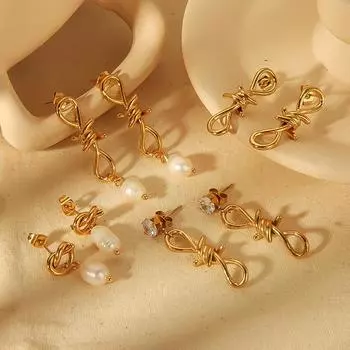 Exaggerated niche high-end bow pearl earrings, geometric twist line earrings, jewelry 18k gold does not fade
