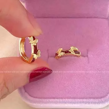 Exquisite design cute butterfly earrings women s niche versatile high-end earrings autumn and winter fashion light luxury ear buckles copper