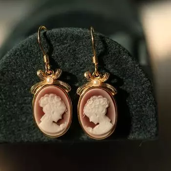 Фабричные продажи Серебряная инкрустация Camio Relief Beauty Bow Eardrops красный