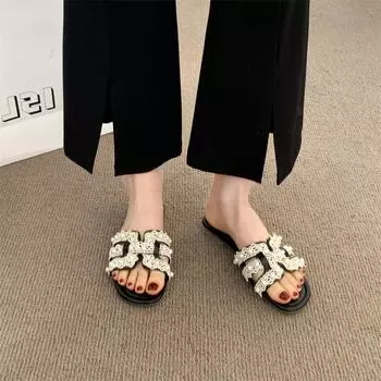 Fairy wind flat bottom cool slippers female outer wear 2025 summer new fashion pearl beach flat bottom one-word 35 чёрный