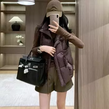 Fashion down vest women s 2024 autumn and winter stand-up collar lightweight thickened vest outer wear loose vest tide S чёрный