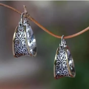 Fashionable hollow earrings серебряный