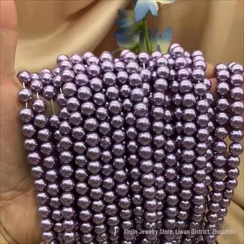 Фиолетовые бусины из ракушек для создания украшений своими руками