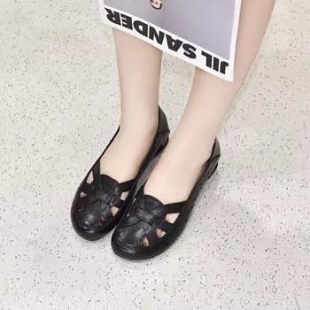 Flat shoes women s spring and summer new round head hollow woven small single shoes first layer cowhide comfortable punching 34