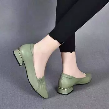 Flat shoes women s spring new pointed head first layer cowhide lotus leaf edge work women s shoes shallow mouth single shoes 35