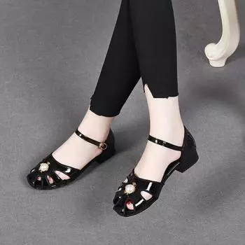 Flat-soled sandals women s bag head hollow low-heeled sandals hollow pearl cow patent leather one-word button shoes 34