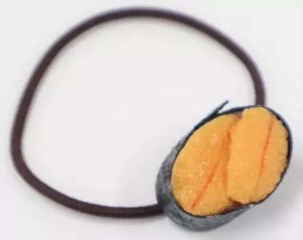 Food sample Hair tie Sushi Sea urchin Lunch belt