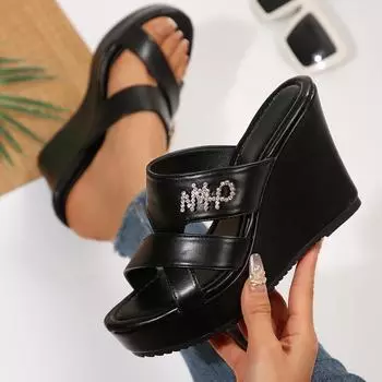 Foreign trade large size slope heel cool slippers women s outer wear 2025 new summer hollow waterproof table thick bottom one-word drag 36